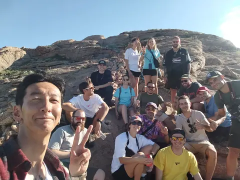 Group selfie on the rocks