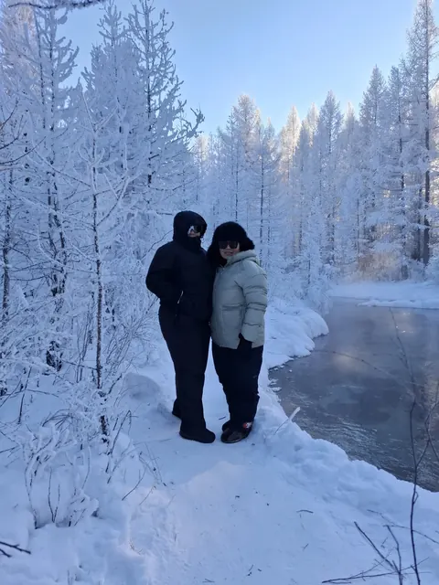 Winter walk by a frozen river