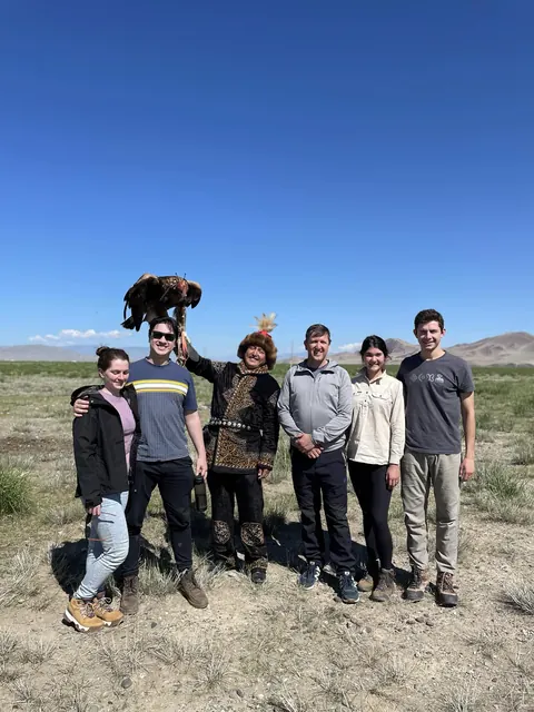 Travelers meeting an eagle hunter