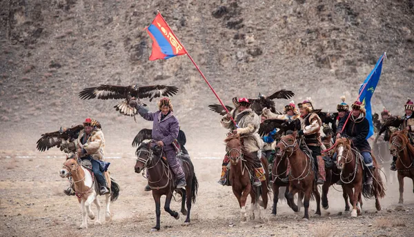 Eagle hunters on horseback at the Golden Eagle Festival