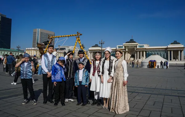Families in traditional dress on Sukhbaatar Square